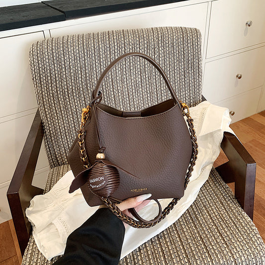 Solid Color PU Leather Bucket Handbag With Chain Strap, Stylish Autumn Shoulder Bag For Women