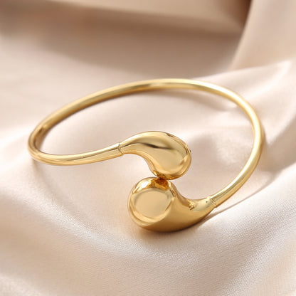 Electroplated Gold Titanium Steel Circle Bangle Featuring Durable Design