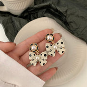 White Cushioned Triangular Ear Clip