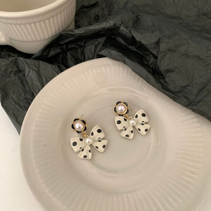 Bow Tie Stud Earrings In Dyed Black Alloy With 925 Sterling Silver Ear Pins
