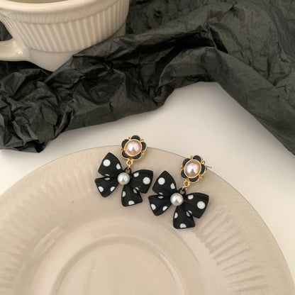 Bow Tie Stud Earrings In Dyed Black Alloy With 925 Sterling Silver Ear Pins