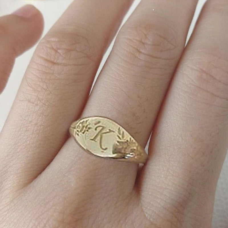 Retro Copper Letter Carving Ring For Women With Golden Electroplated Finish
