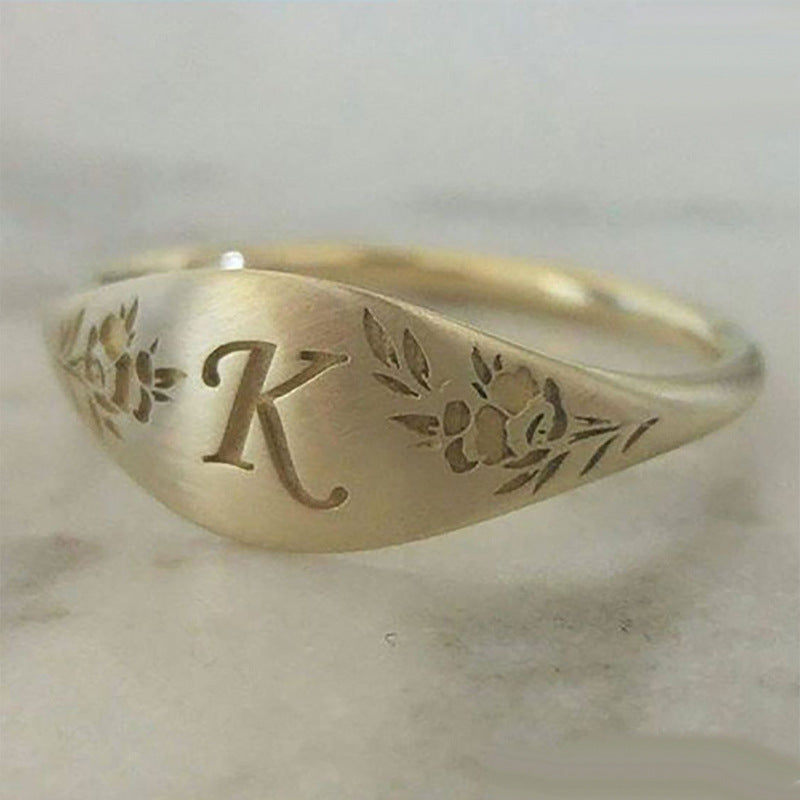 Retro Copper Letter Carving Ring For Women With Golden Electroplated Finish