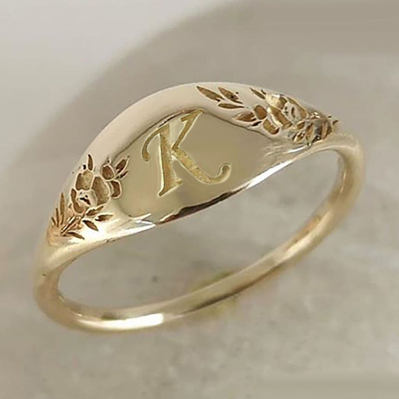 Retro Copper Letter Carving Ring For Women With Golden Electroplated Finish