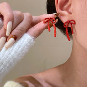 08 Wine Red Fine Bow Ear Studs 11788