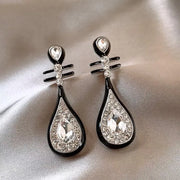 Silver Needle: Black Dripping Pipa Ear Studs