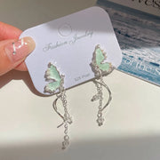 STW Rotating Blue Butterfly Tassel Earrings