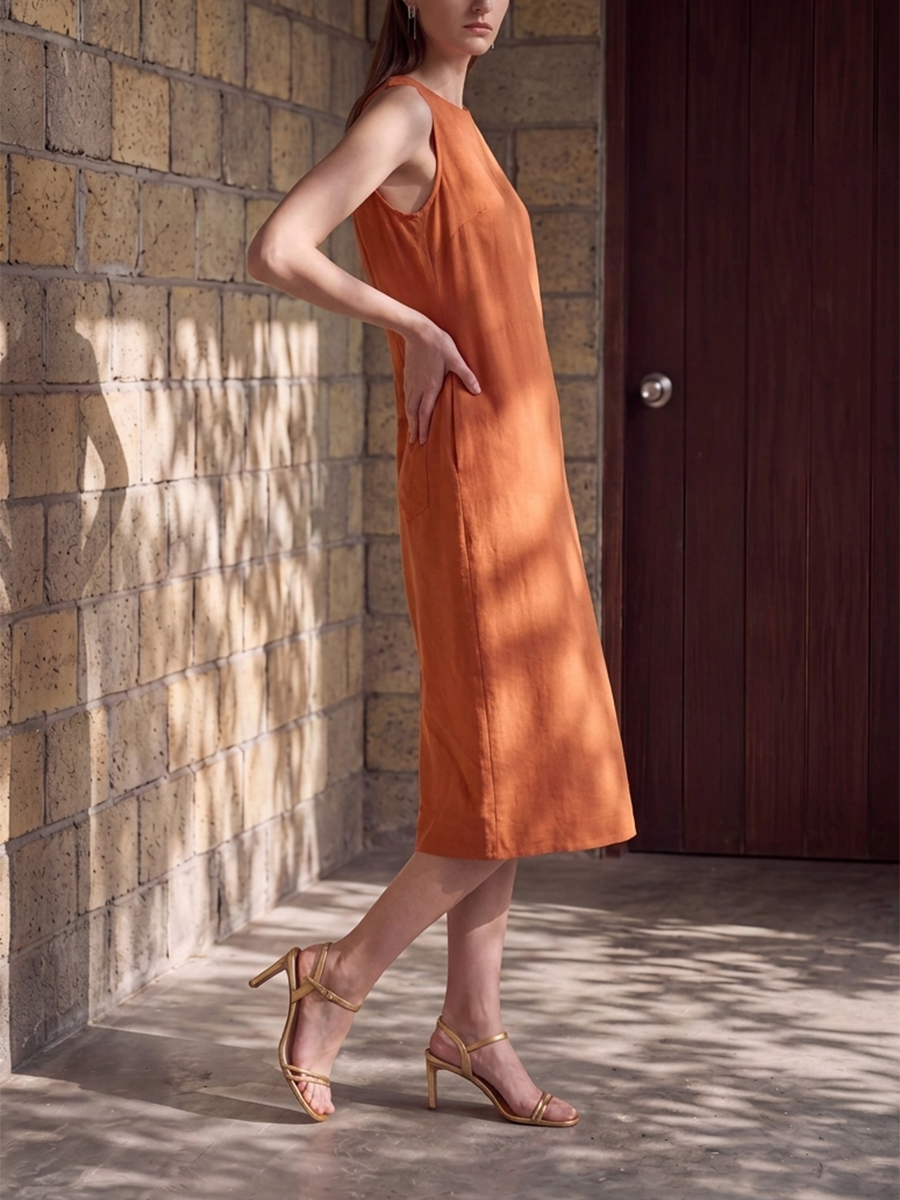 Loose Sleeveless Pockets Solid Color Round-Neck Midi Dresses