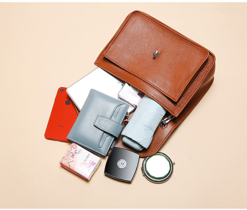 Retro small square bag slung over one shoulder bag