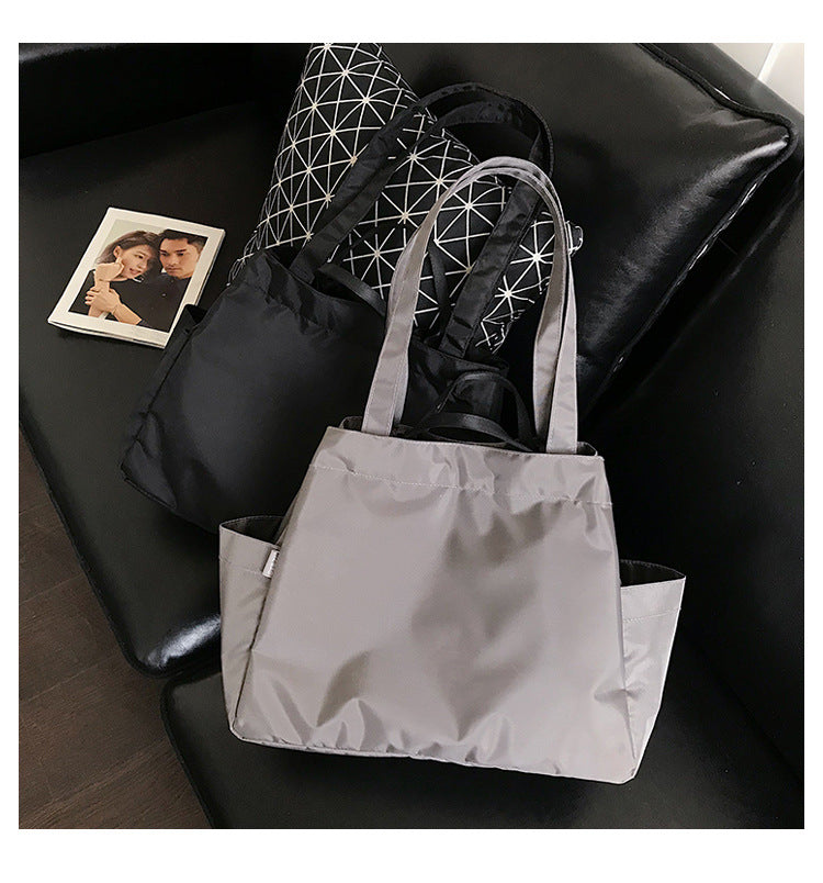 fashionable hand-held single-shoulder bag