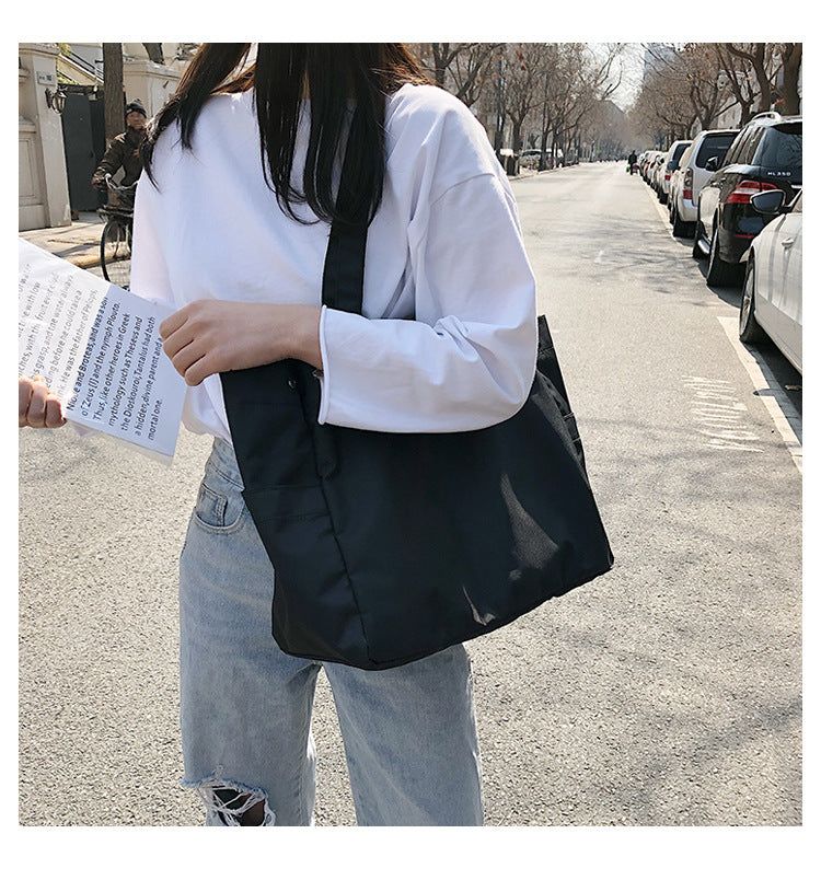 fashionable hand-held single-shoulder bag