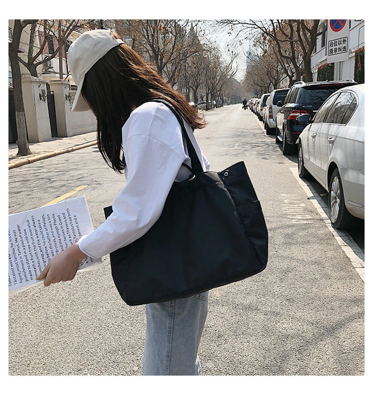 fashionable hand-held single-shoulder bag