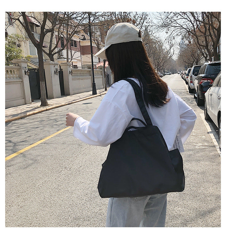 fashionable hand-held single-shoulder bag
