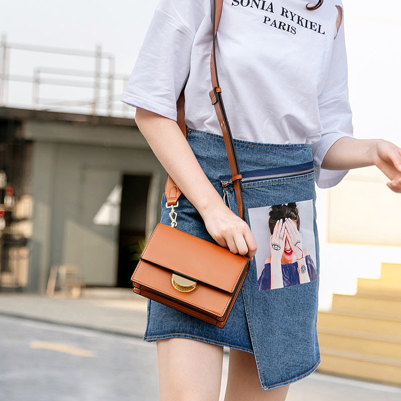 Semi-circle buckle shoulder slung small square bag