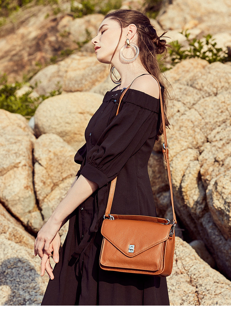 Retro small square bag slung over one shoulder bag