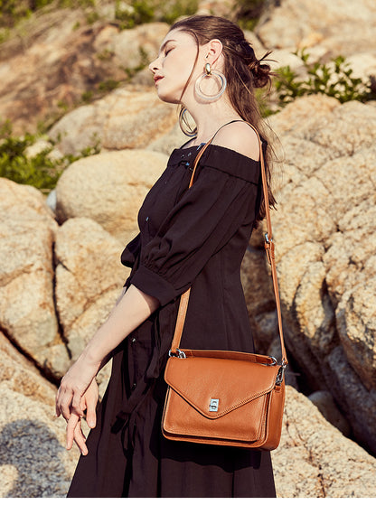 Retro small square bag slung over one shoulder bag