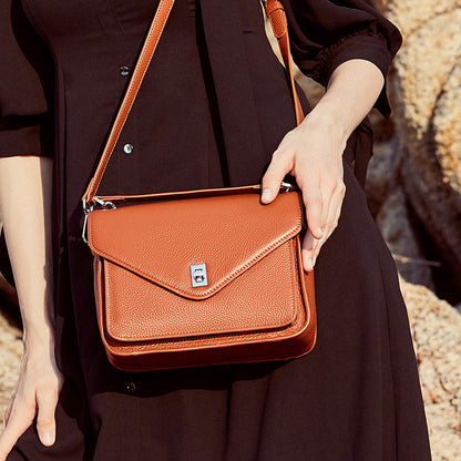 Retro small square bag slung over one shoulder bag