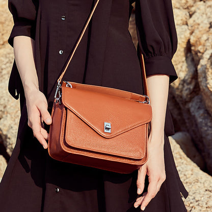 Retro small square bag slung over one shoulder bag