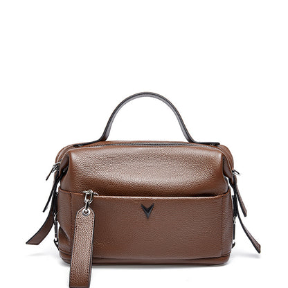 Cowhide handbag with shoulder slanting straddle for ladies