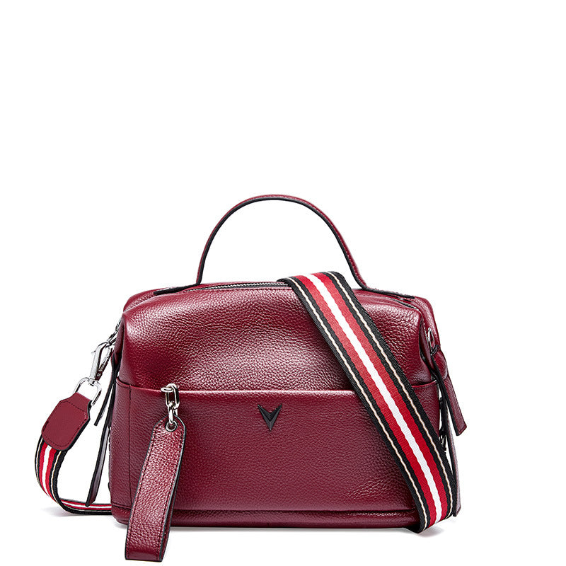 Cowhide handbag with shoulder slanting straddle for ladies