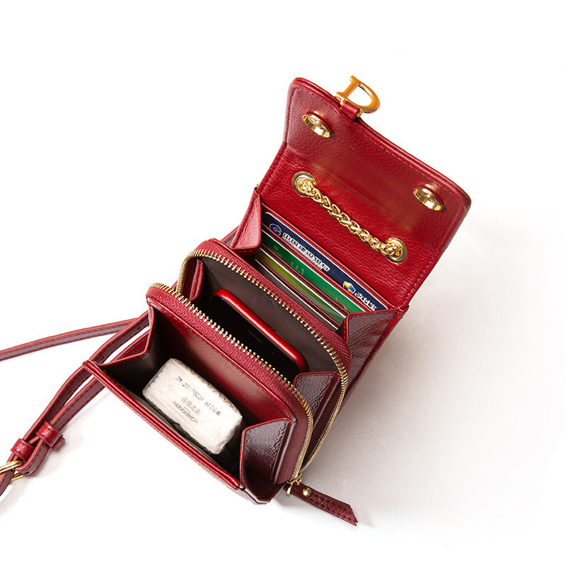 Single shoulder slung leather mini bag