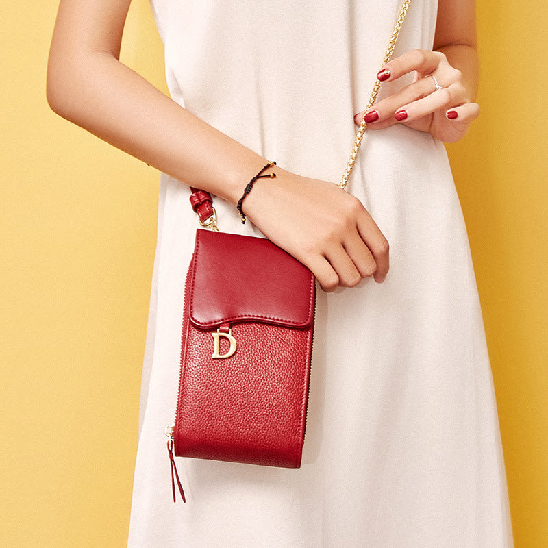 Single shoulder slung leather mini bag