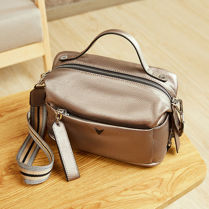 Cowhide handbag with shoulder slanting straddle for ladies