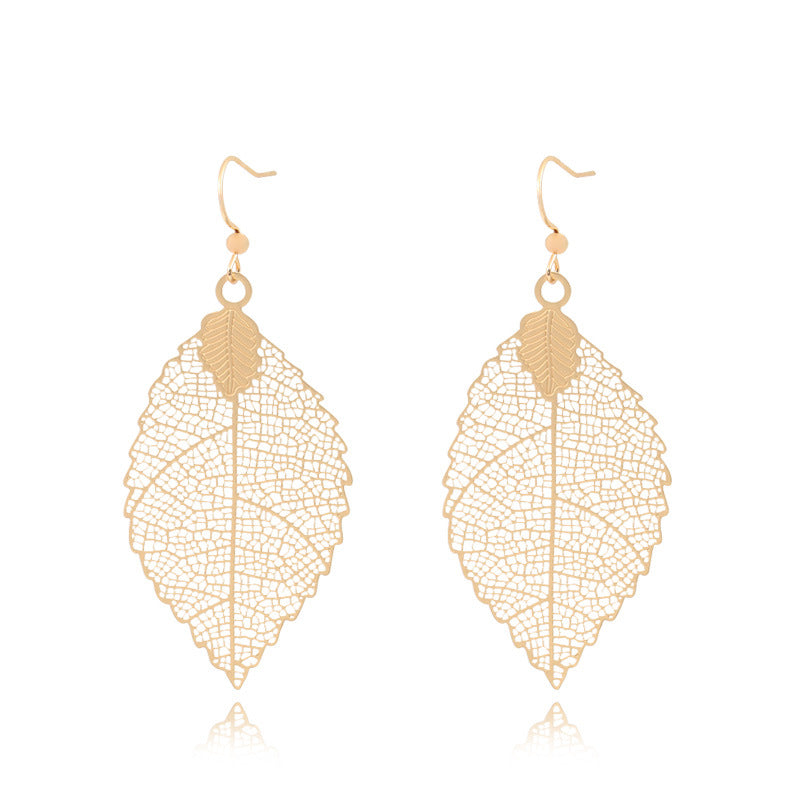 Golden geometric leaf copper earrings