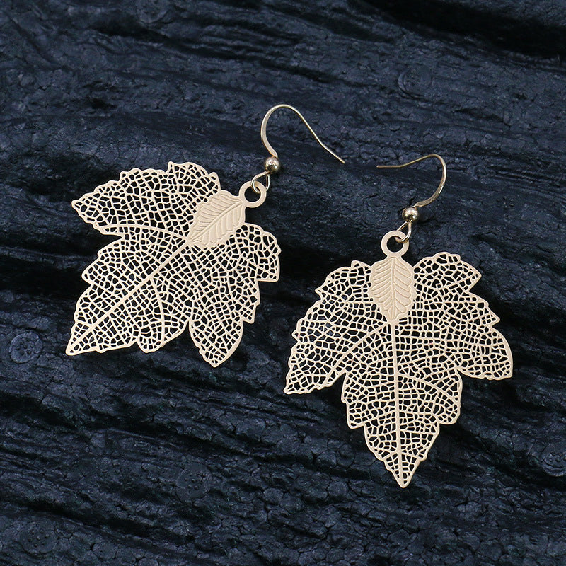Golden geometric leaf copper earrings
