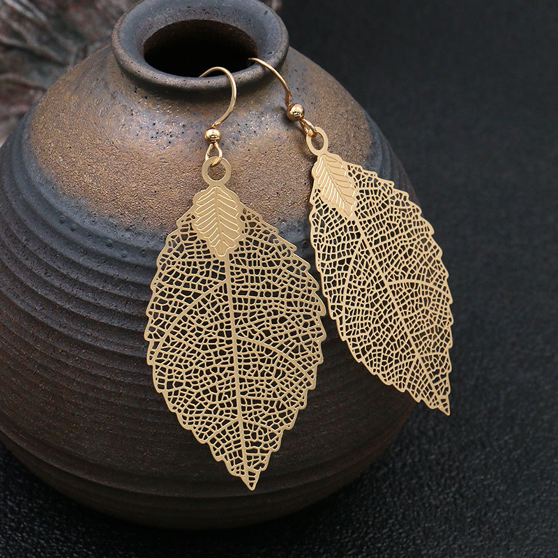 Golden geometric leaf copper earrings