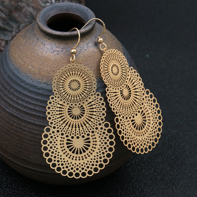 Golden geometric leaf copper earrings