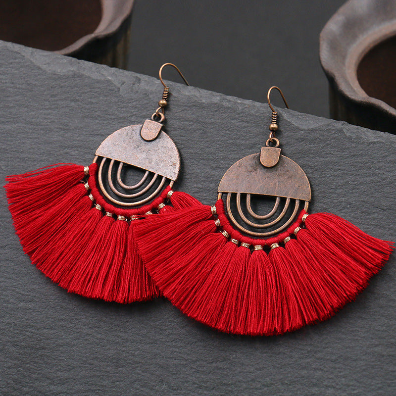 Fashionable hollow-out fan-shaped Bohemian tassel earrings
