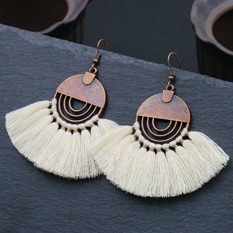 Fashionable hollow-out fan-shaped Bohemian tassel earrings