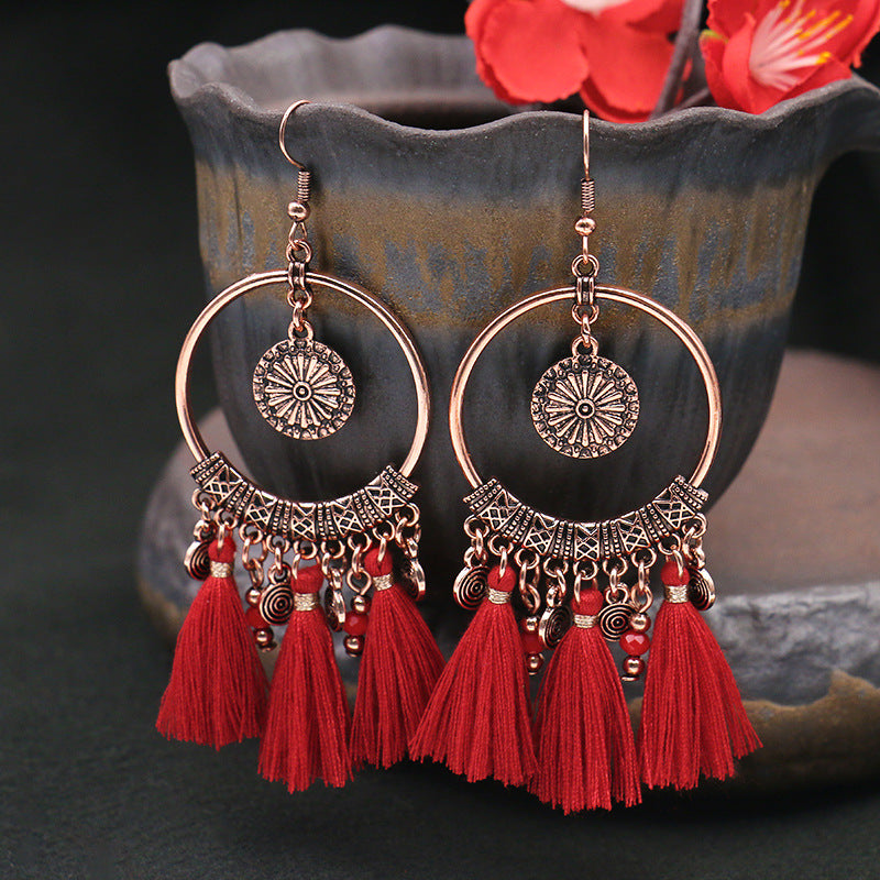 Fringed red earrings