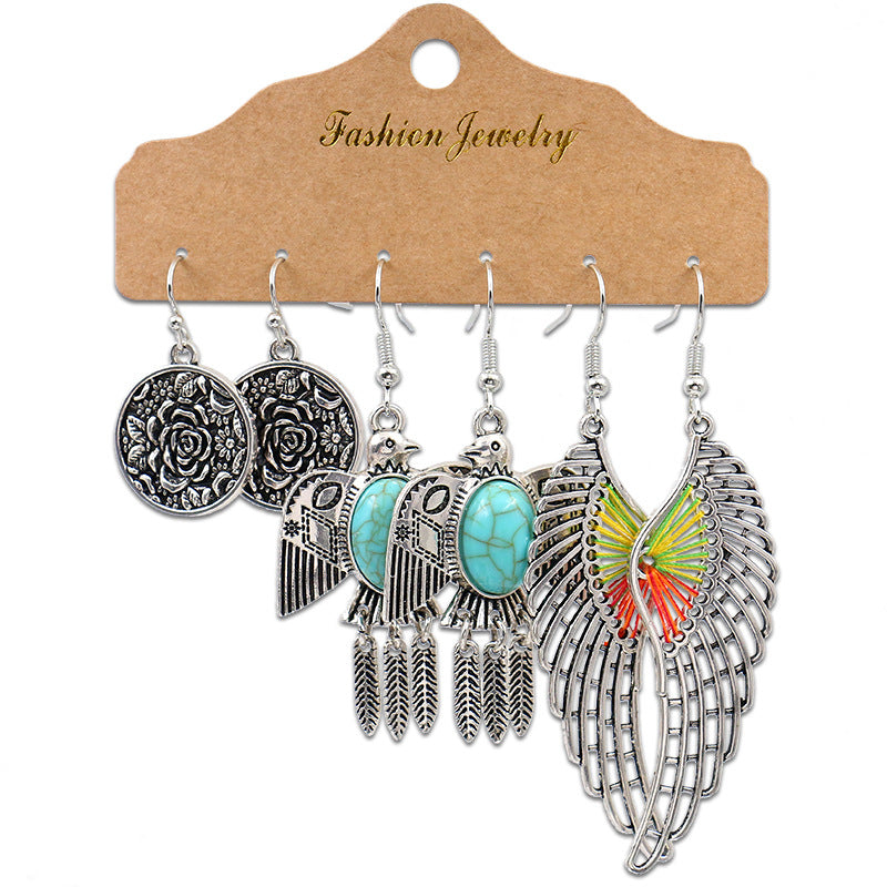 Fashion owl wing earrings