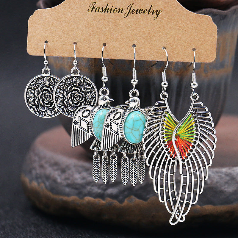 Fashion owl wing earrings