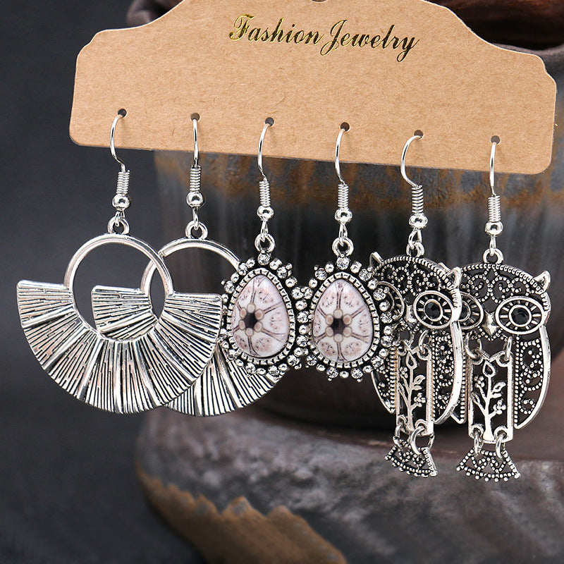Fashion owl wing earrings