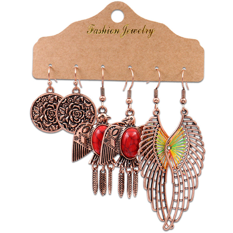 Fashion owl wing earrings