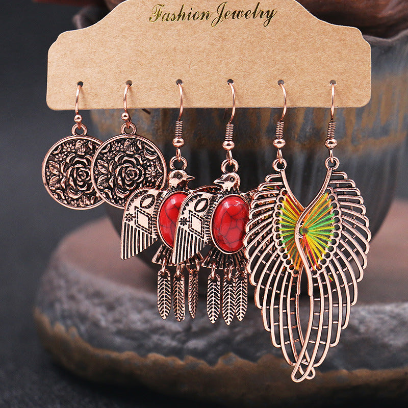 Fashion owl wing earrings
