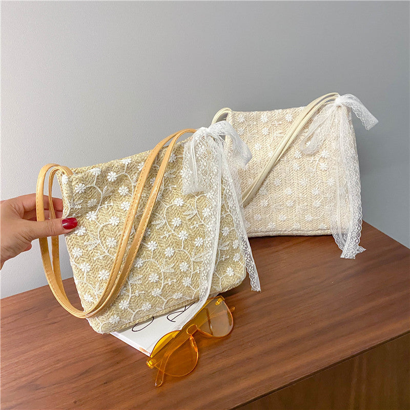 Large capacity bucket hand-held straw woven women's bag