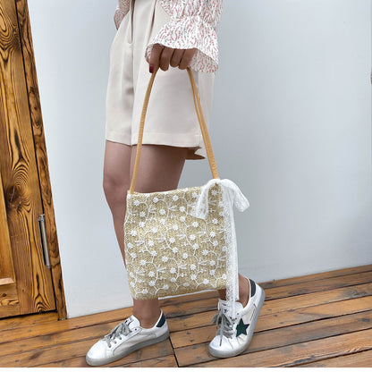 Large capacity bucket hand-held straw woven women's bag