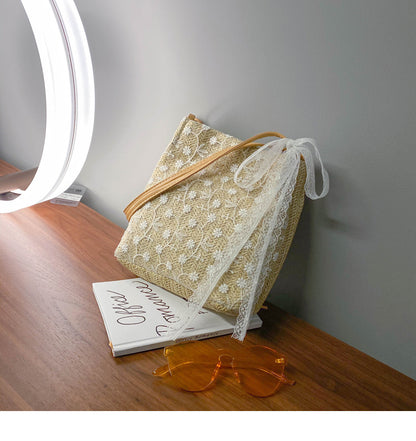 Large capacity bucket hand-held straw woven women's bag