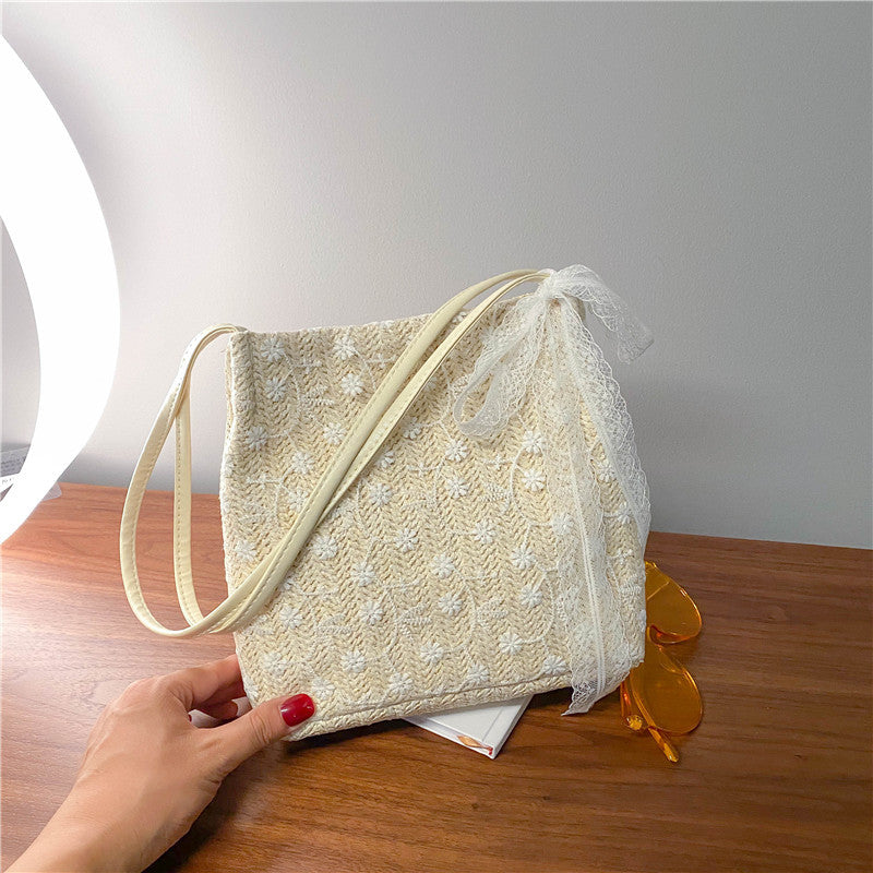 Large capacity bucket hand-held straw woven women's bag