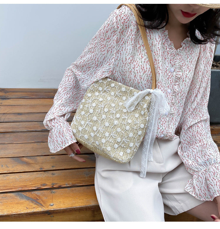 Large capacity bucket hand-held straw woven women's bag