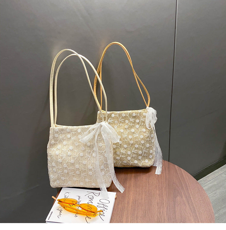 Large capacity bucket hand-held straw woven women's bag