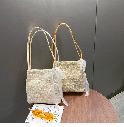 Large capacity bucket hand-held straw woven women's bag