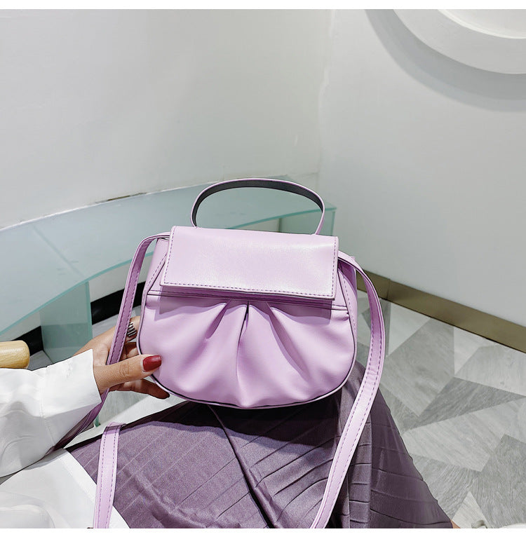 Pleated portable one shoulder cross saddle bag
