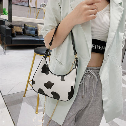 Cow pattern portable messenger bag