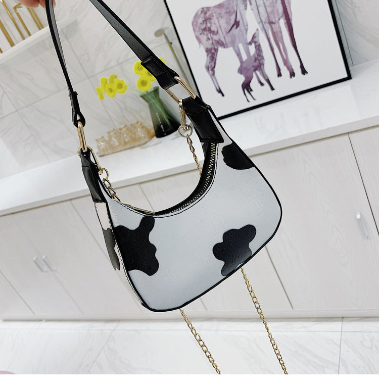 Cow pattern portable messenger bag