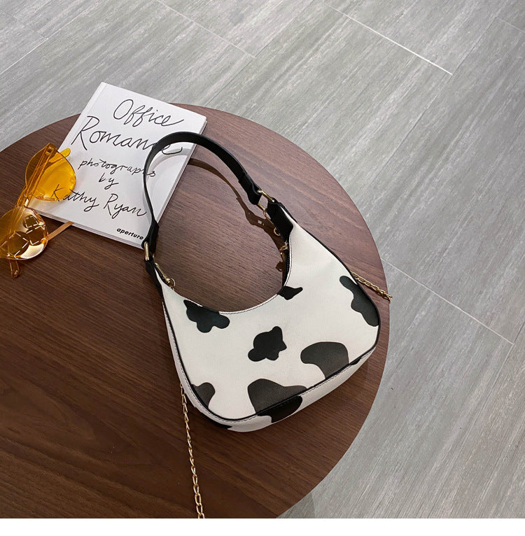 Cow pattern portable messenger bag